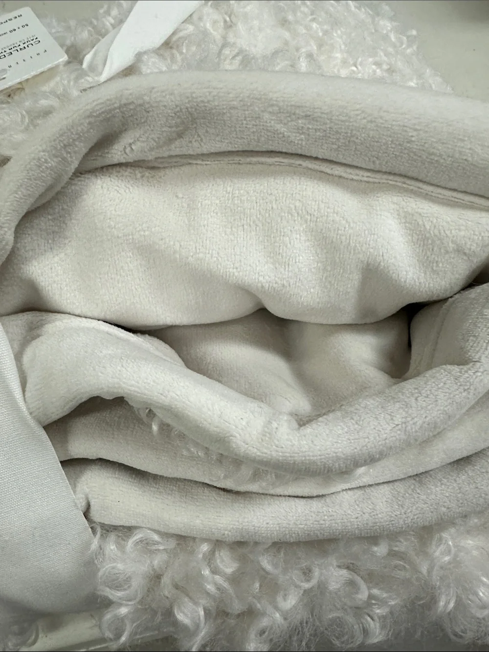 NWT Pottery Barn Curled Luxe faux fur throw.  Ivory 50x60.